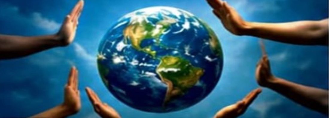 Hands gathered around planet Earth, symbolising shared responsibility